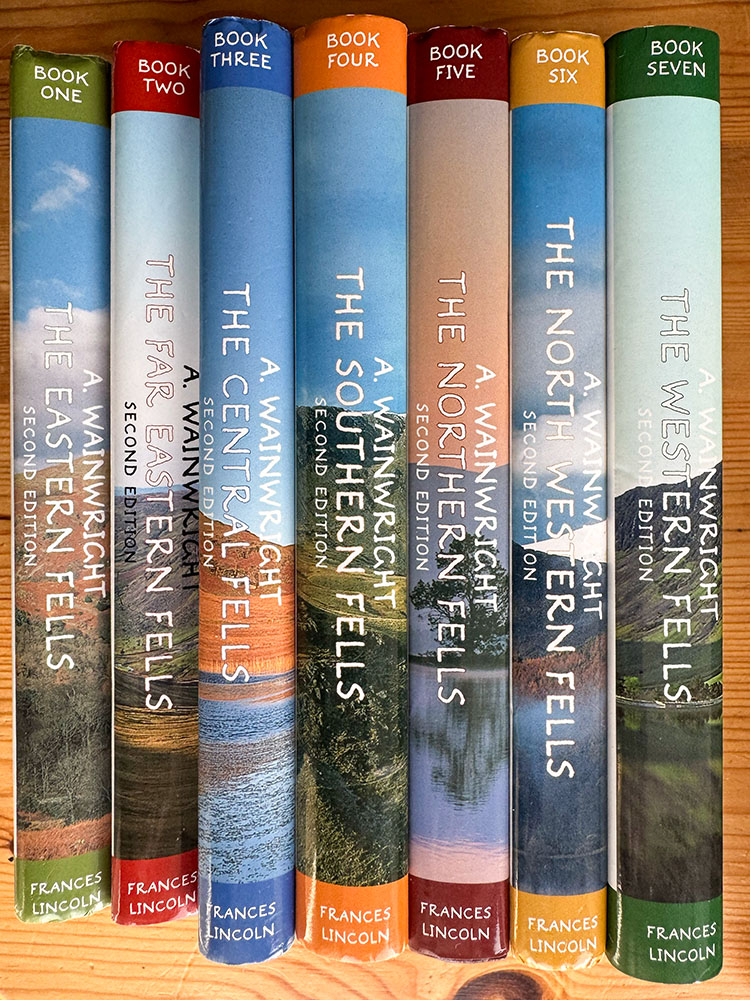 The author's collection of the Chris Jesty revised version of Wainwright's Seven Pictorial Guides to the Lakeland Fells