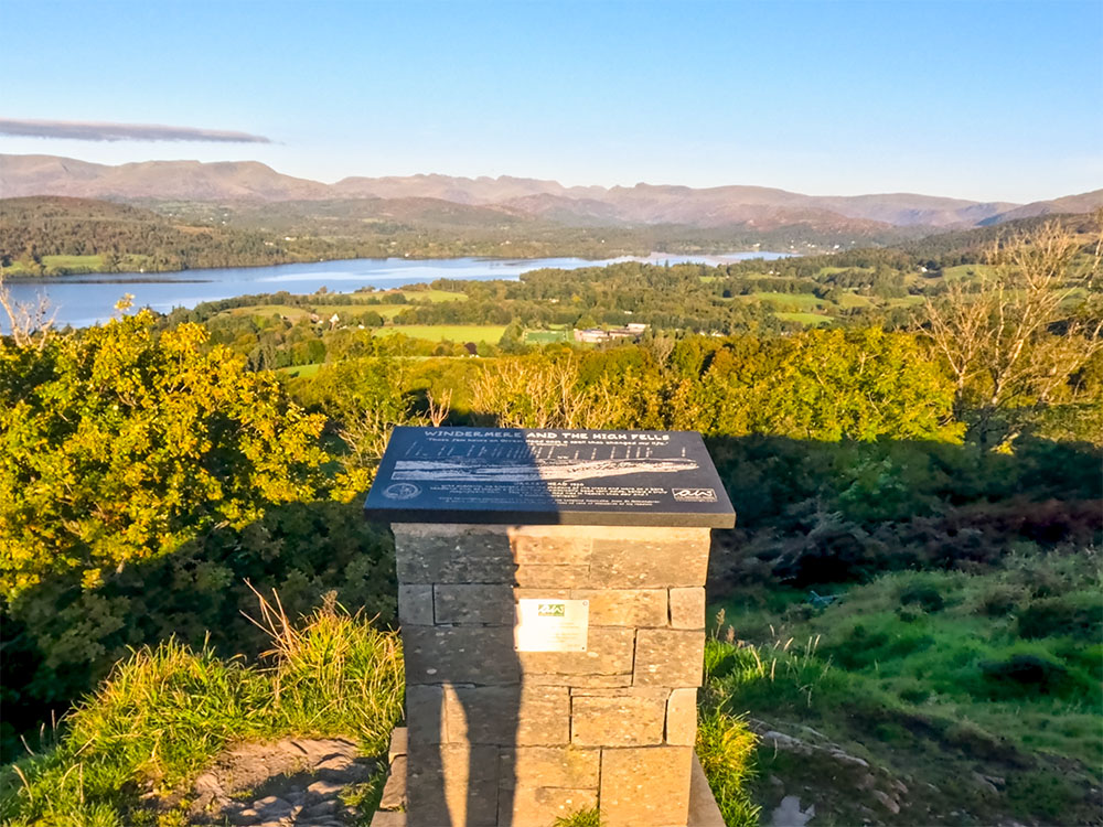 A plaque commemorating Wainwright, showing each of the main Lakeland Summits