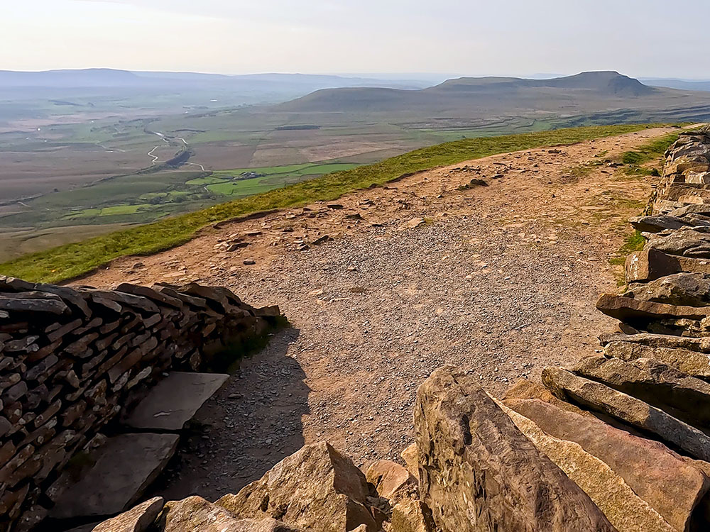 Pen-y-ghent, the Ribblehead Viaduct and Ingleborough from the summit of Whernside