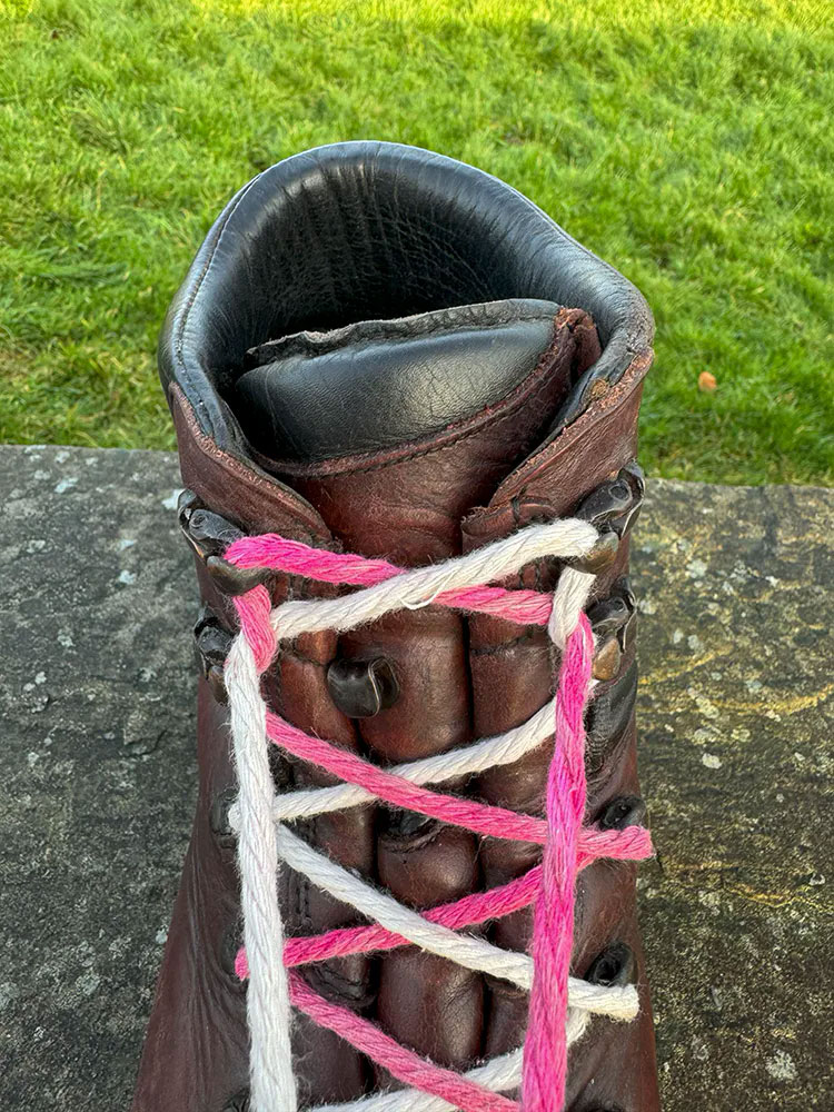 Heel-securing or heel lock lacing on a hiking boot