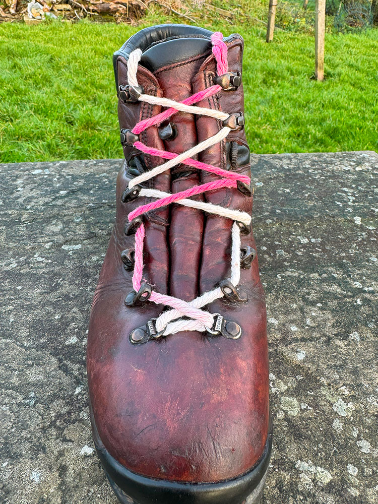 Window lacing on a hiking boot for high arches