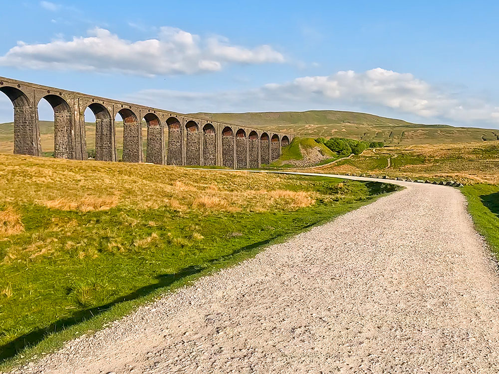 Approaching the Ribblehead Viaduct with Whernside in the background on the Yorkshire 3 Peaks Walk