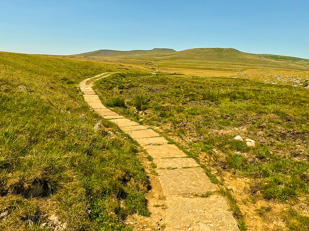 Flagged path heading up in the direction of Ingleborough