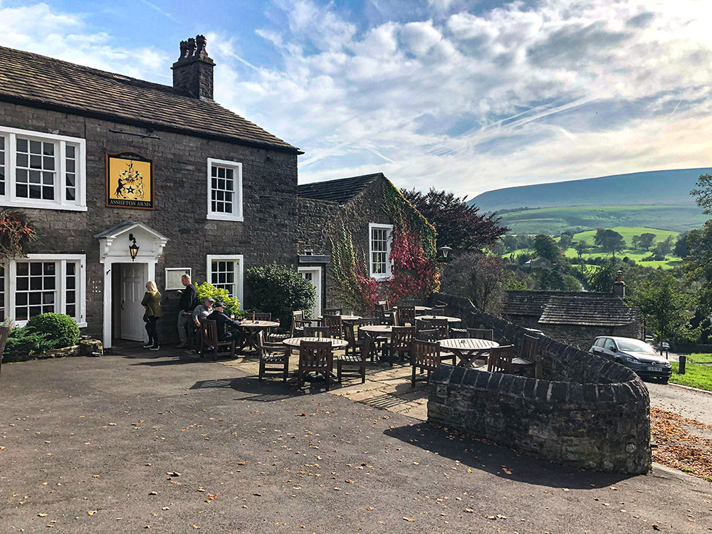 Assheton Arms at Downham with Pendle Hill in the background