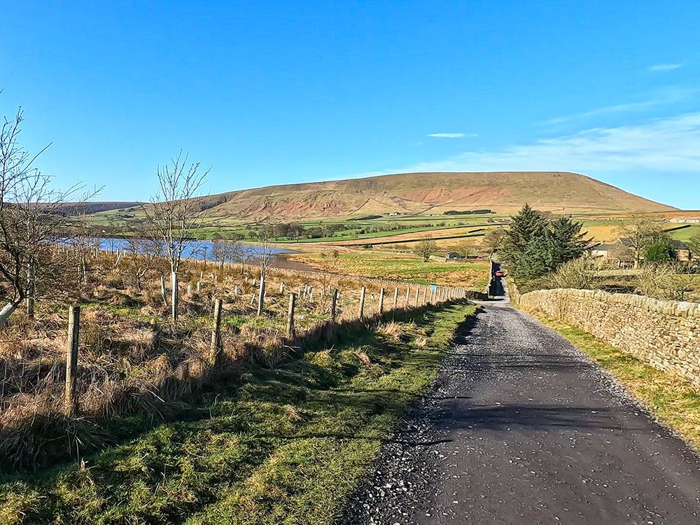 Heading back to Barley with Lower Black Moss Reservoir and Pendle Hill ahead