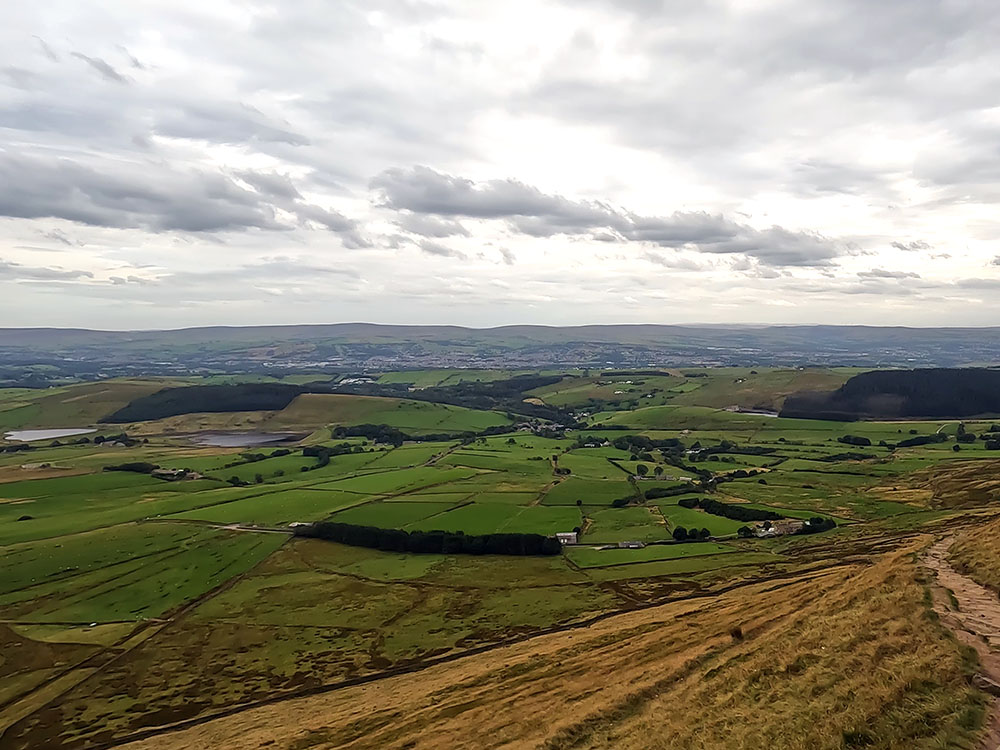 Looking back down the Pendle Hill steps towards Upper and Lower Black Moss Reservoirs and Lower Ogden Reservoir