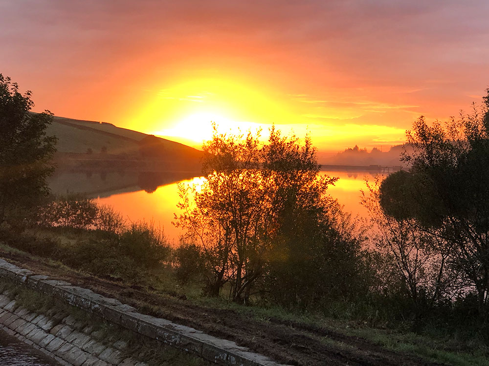 Early morning sunrise over Lower Ogden Reservoir near Pendle Hill