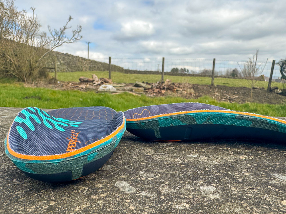 The rear and side views of a high-arch Superfeet insole