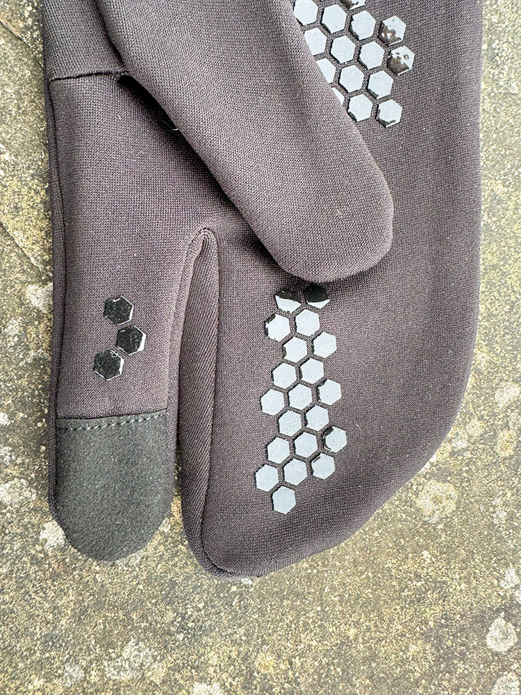 Touchscreen compatible insert on the finger of a hiking glove