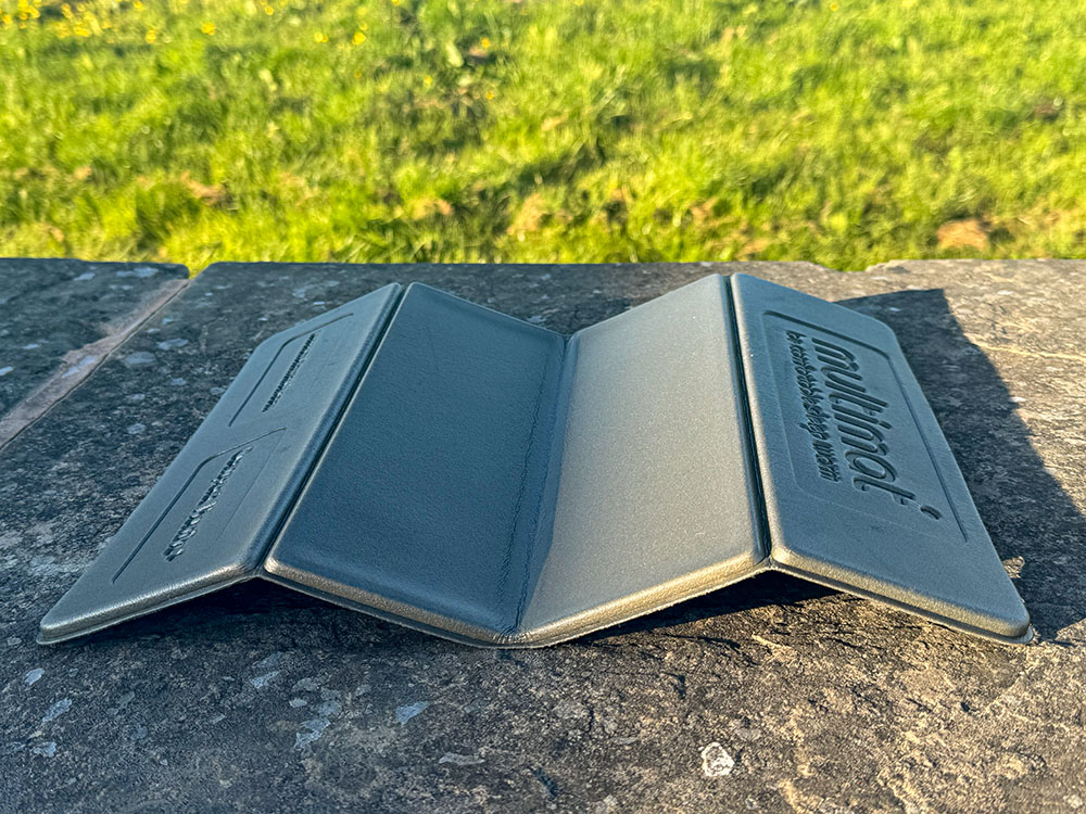 Close-up of the thin closed-cell foam layers on the Multimat Compact Kumfie sit mat.