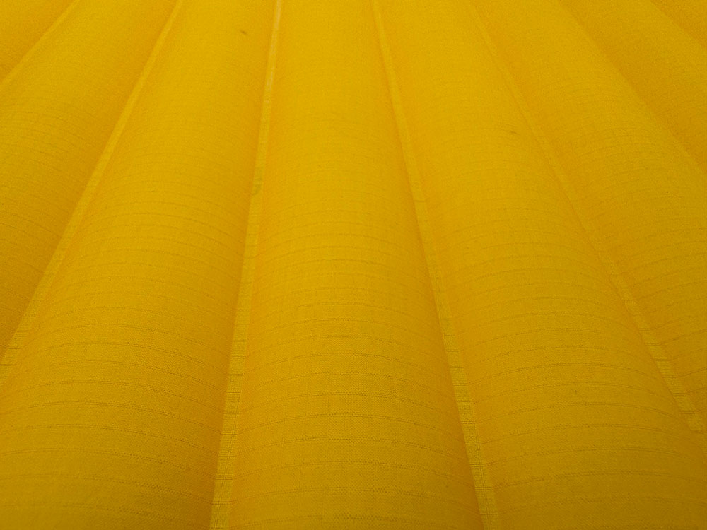 The more 'shiny' top found on many air beds keeps weight down, but you can slide around a little on it