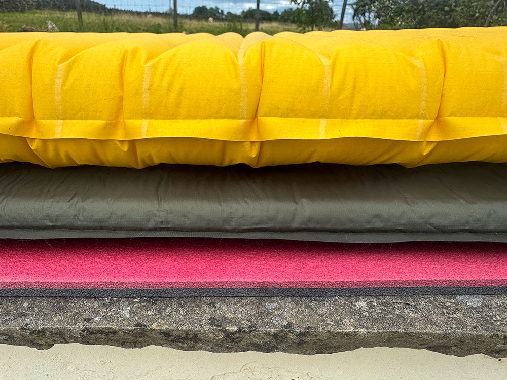 An air sleeping mat, a self-inflating mat and a closed foam sleeping mat