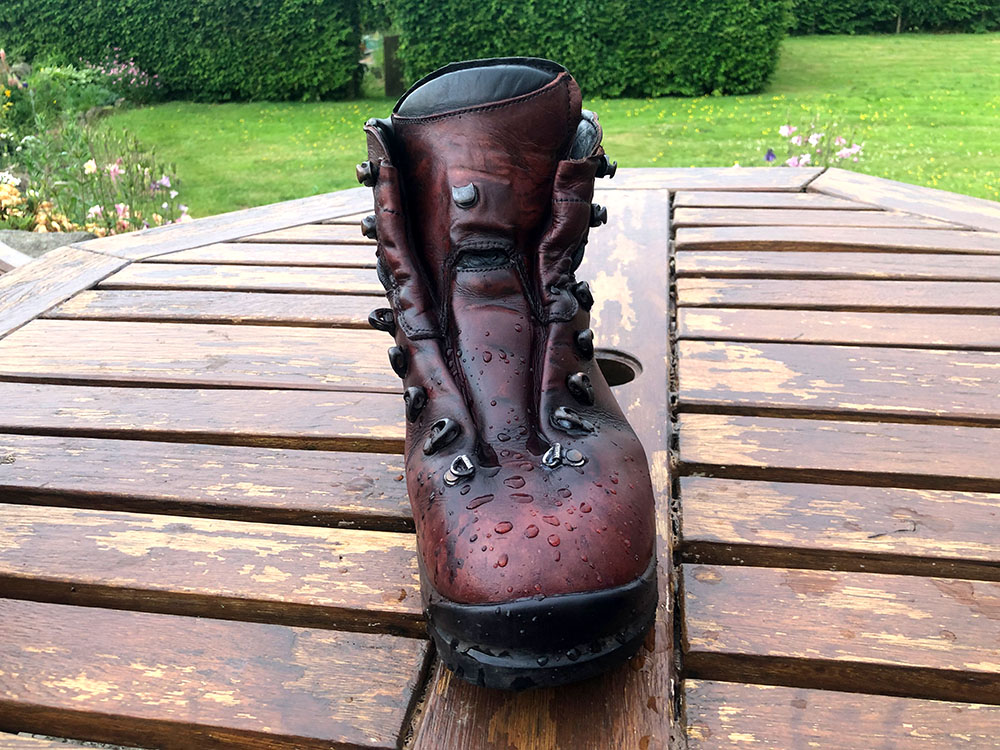 Hiking boot after cleaning and reproofing - boot starts to bead and repel water again