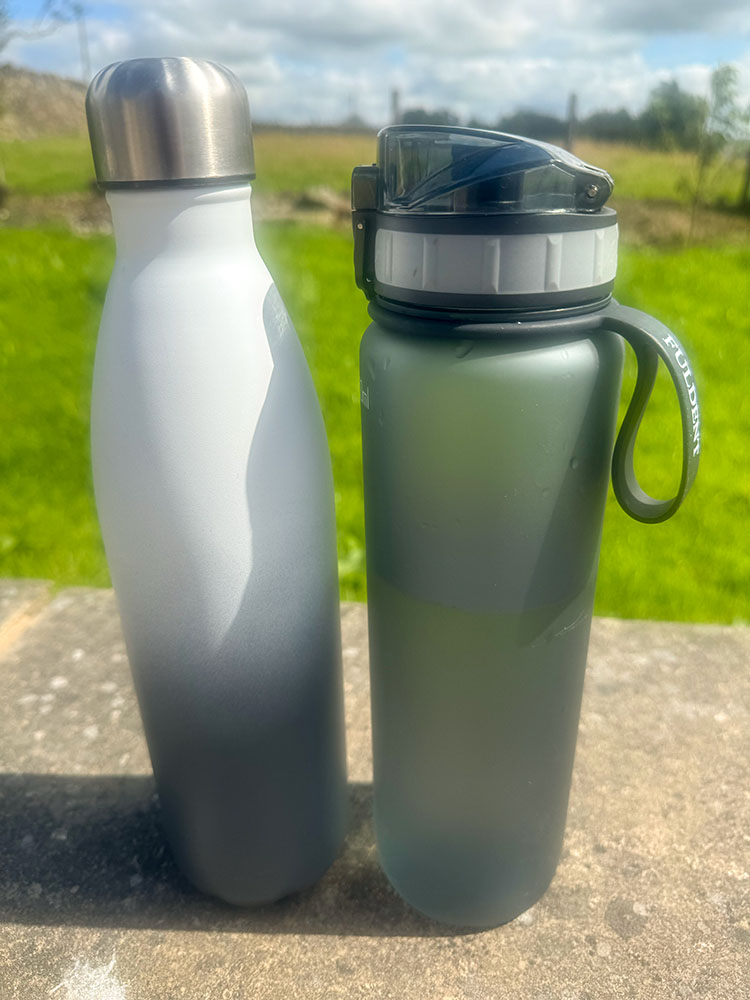 A metal and a plastic water bottle