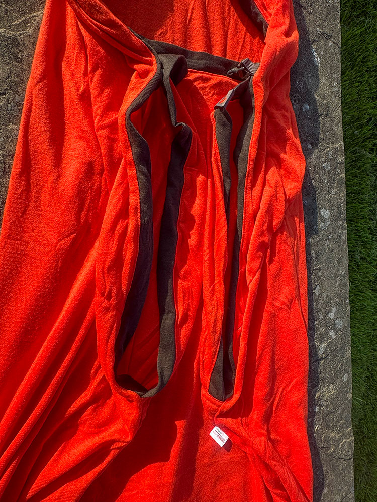 The arm openings near the top of a Sea to Summit Thermal Liner