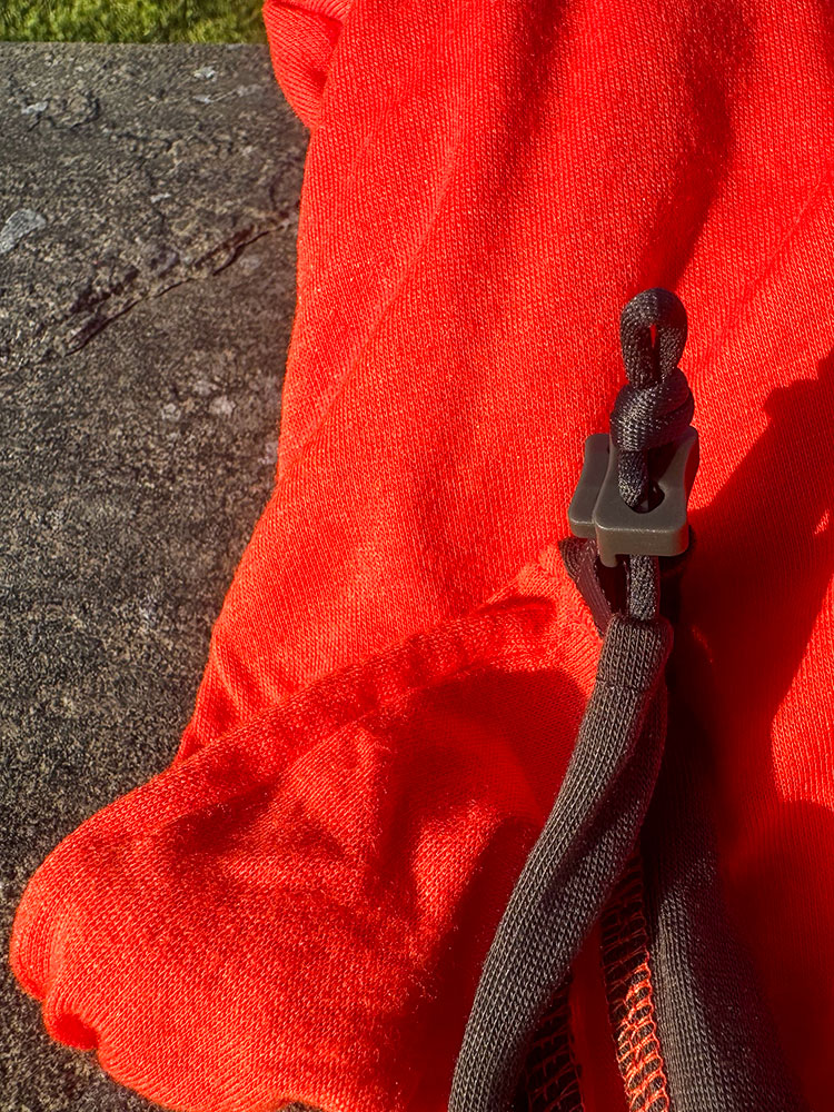 The drawcord on a sleeping bag liner