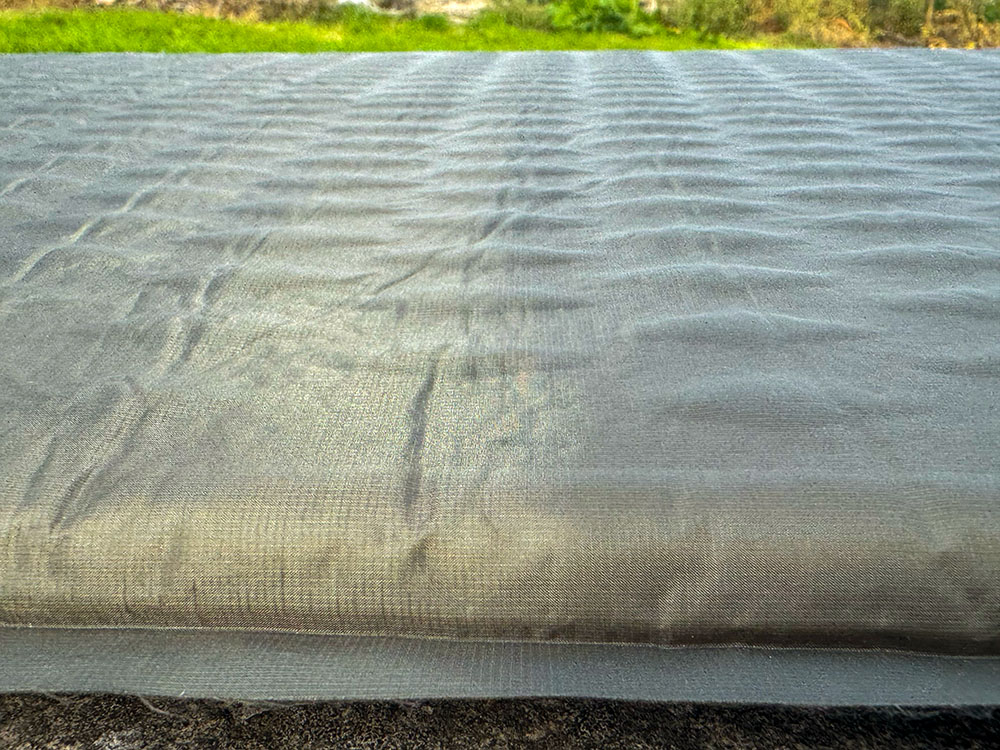 Self-inflating mat