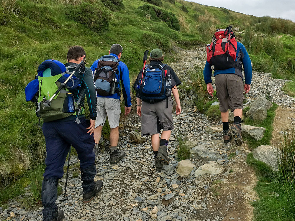 Four hikers on a day hike over Snowdon