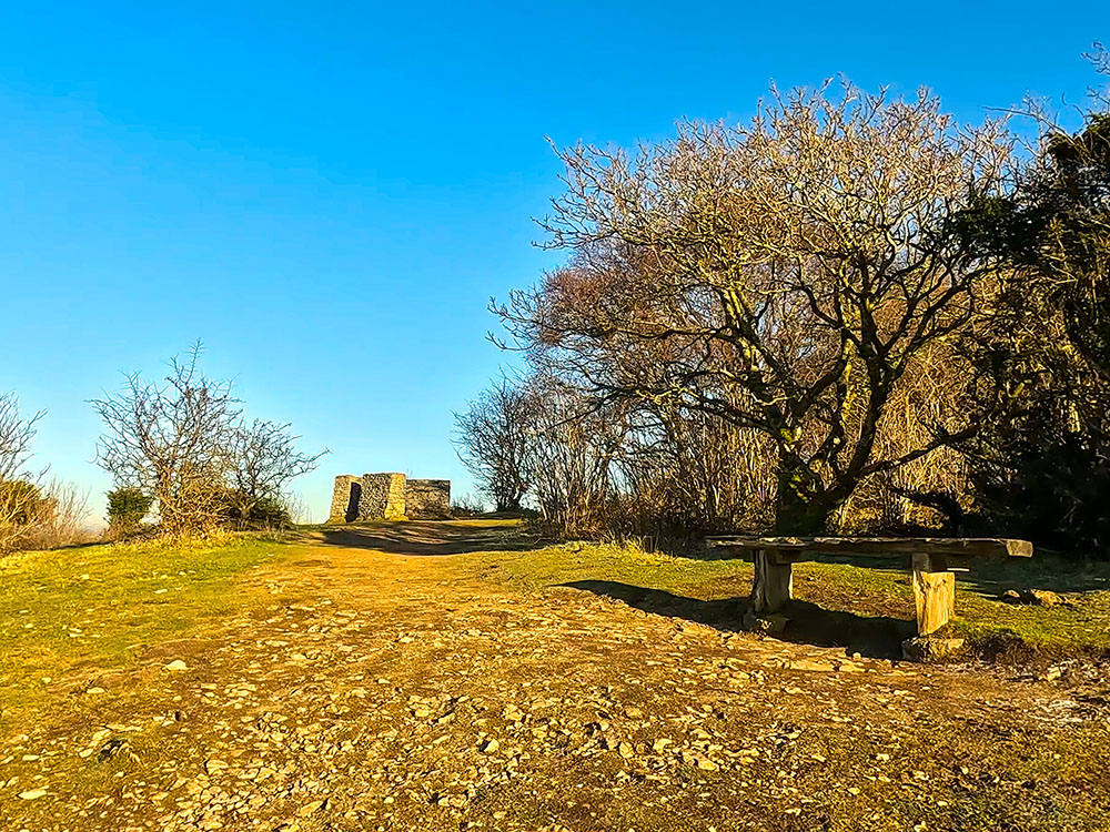 Approaching a bench and the toposcope on Arnside Knott