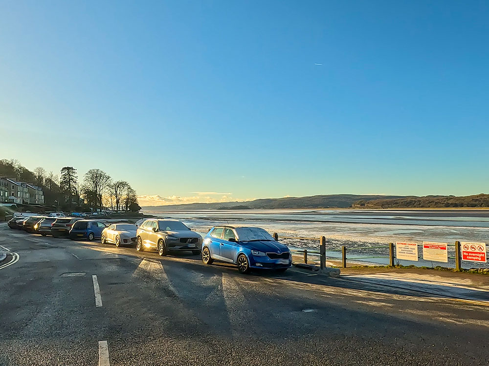 Looking along the road and estuary opposite the Albion at Arnside