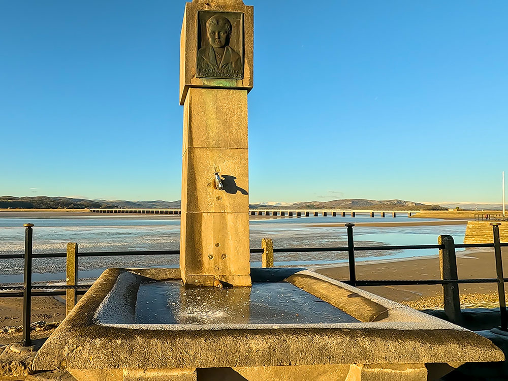 The frozen water fountain with Arnside Viaduct behind