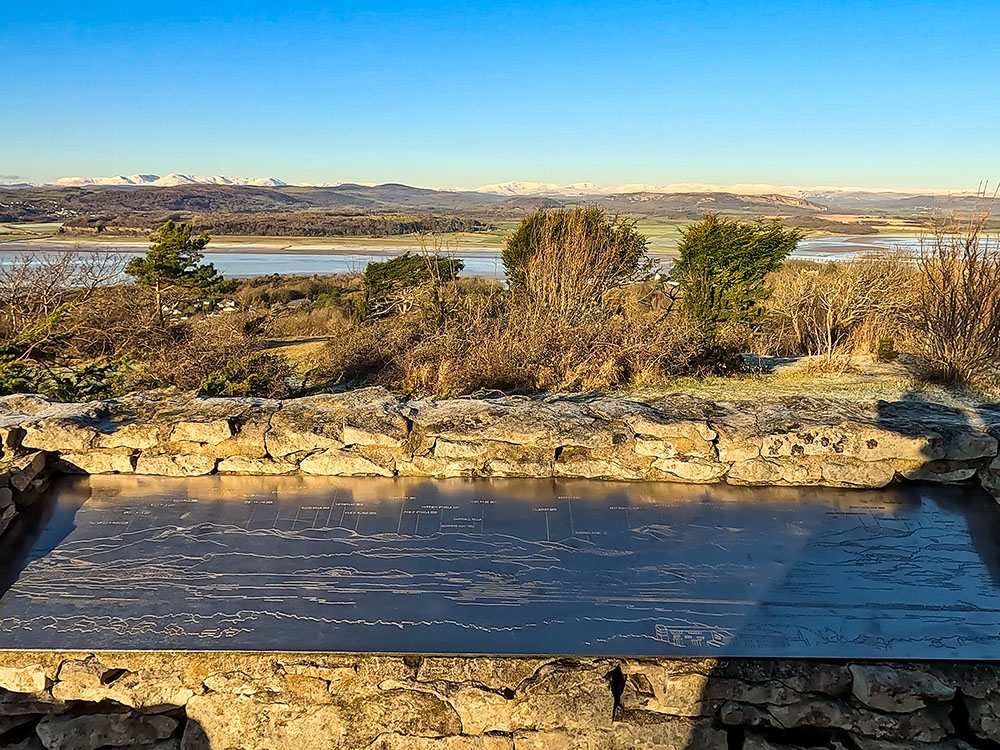 View from the larger middle toposcope towards the Lakeland Fells from on the left Walna Scar Pass, round to amongst others Coniston Old Man, Bowfell, Skiddaw, and Harter Fell (Mardale)