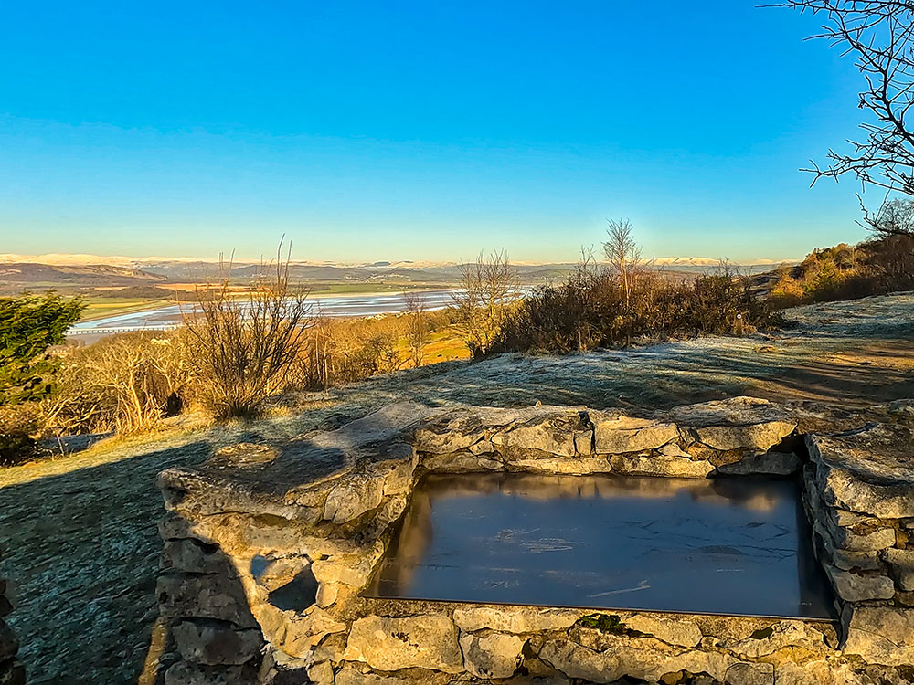 View from the right-hand toposcope on Arnside Knott looking over Arnside Viaduct with Shap Fells and Howgills beyond