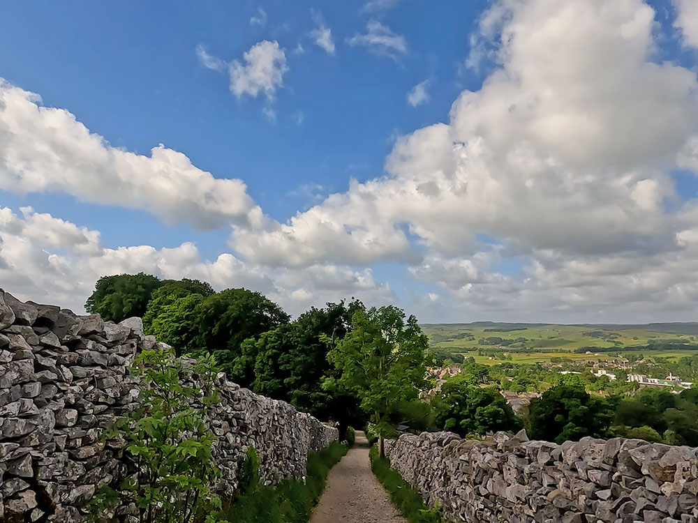 Heading back down the walled path