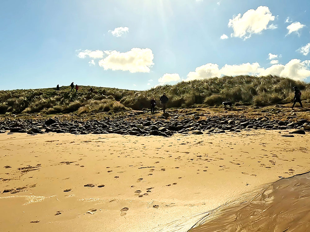 Leaving Embleton Bay sands heading back onto the coast path