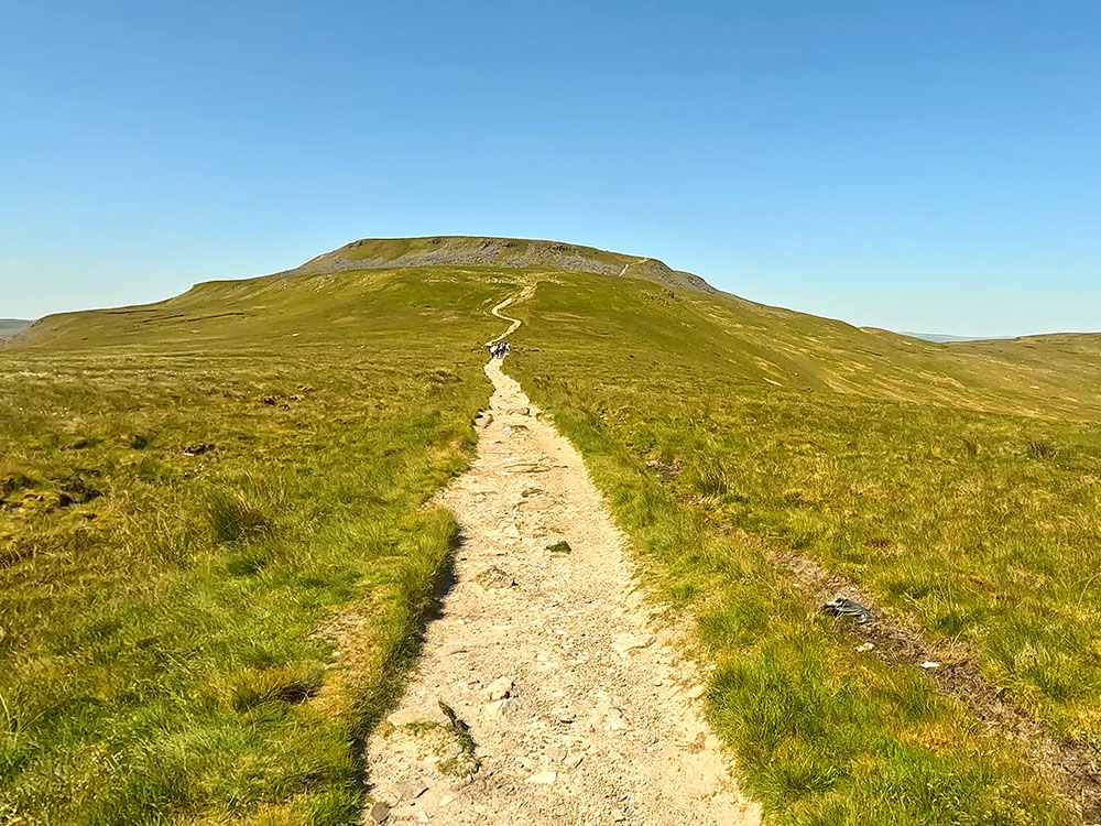 The path from Little Ingleborough heading up towards the flat-topped plateau of Ingleborough