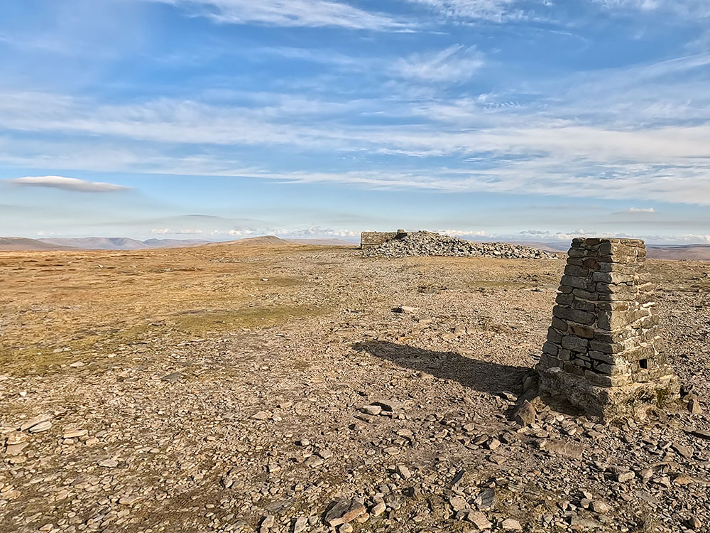 Trig point on Ingleborough and weather shelter