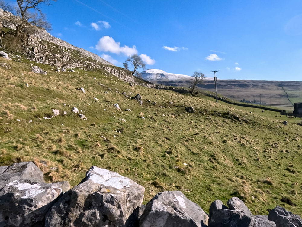 View over to the snow-capped Ingleborough from Twisleton Lane