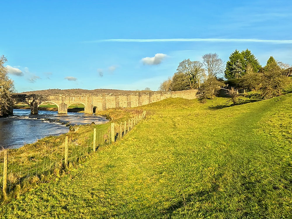 Heading along the River Wharfe towards Grassington Bridge