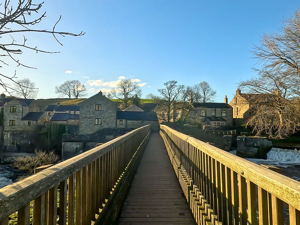 Wooden footbridge over Linton Falls