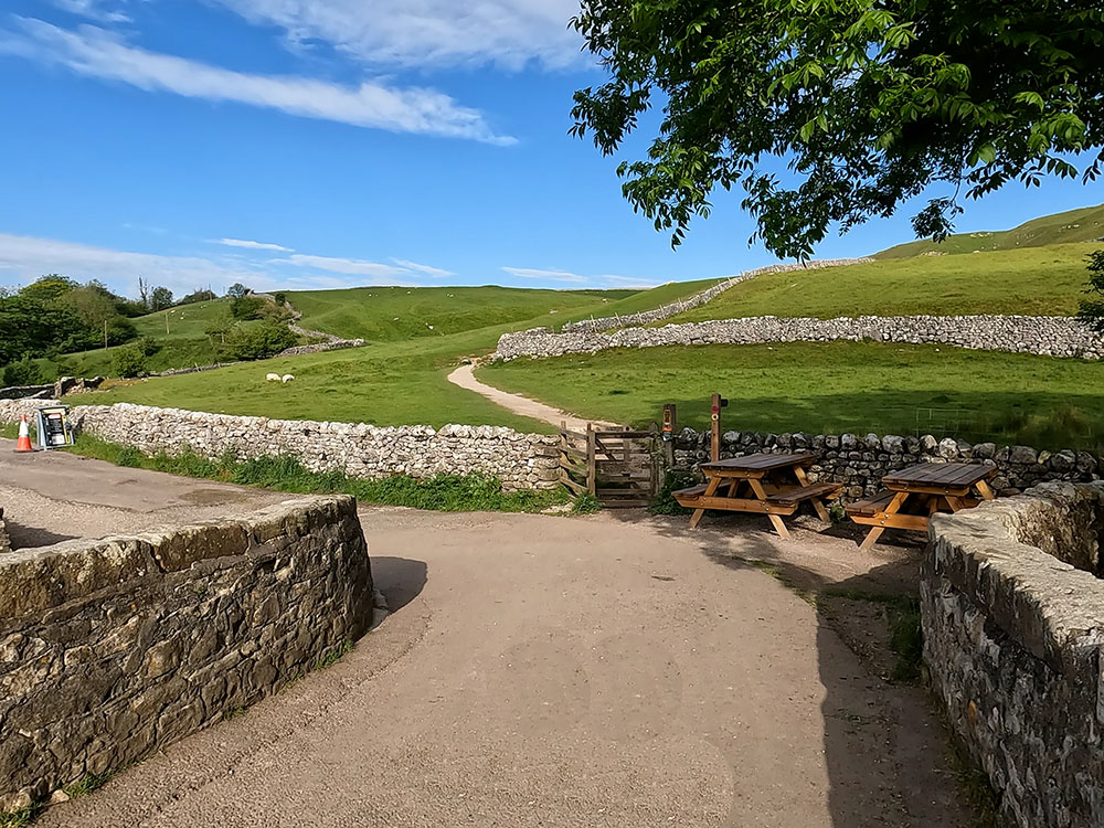 Kissing gate and path leaving the layby