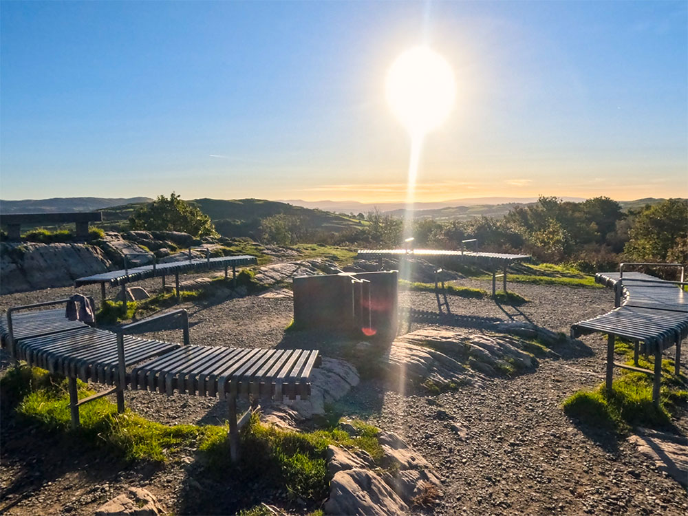 The compass and seating installed on Orrest Head's summit