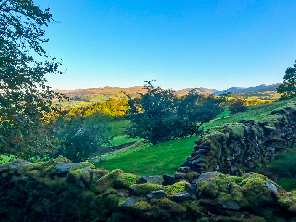 The first glimpse of the Lakeland Fells from the Orrest Head footpath