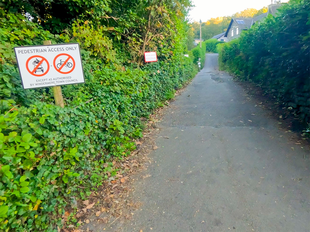The lane that heads up away from the Orrest Head footpath sign