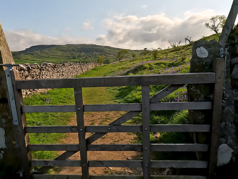 Gate through which path up into Oxenber Wood can be seen