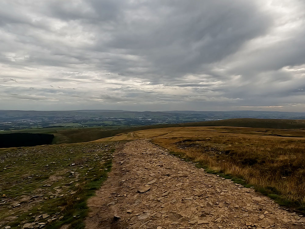 Heading along the top of Pendle Hill from the summit
