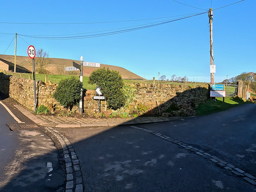 Road junction to turn off to Pendle Sculpture Trail