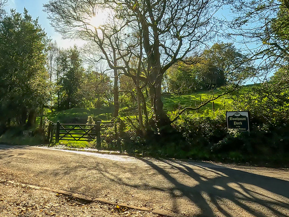 Upon meeting the road, cross over and head through the wooden gate