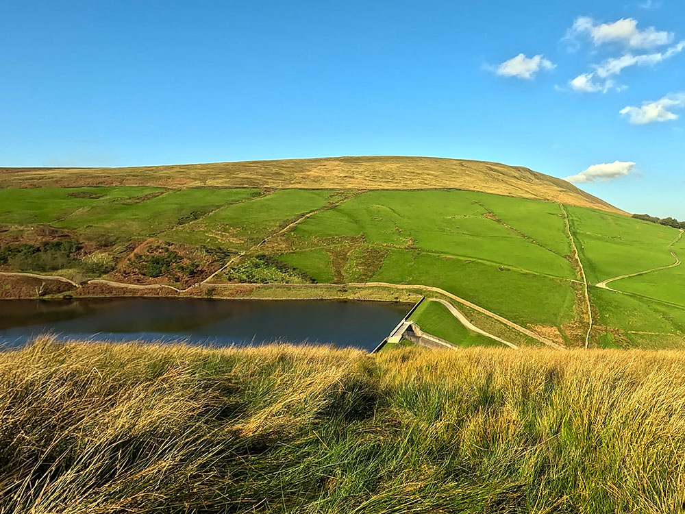 Dropping down towards Upper Ogden Reservoir with Pendle Hill in the background
