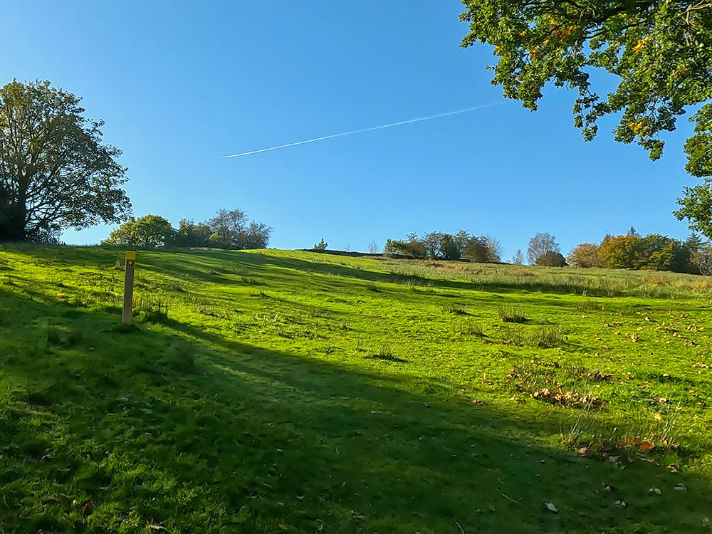 Follow the waymarker up the hill towards Heys Lane