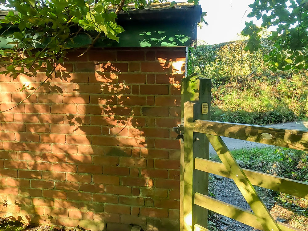 Just through the gate on the Pendle Way by the red brick building on the Pendle Witches Walk