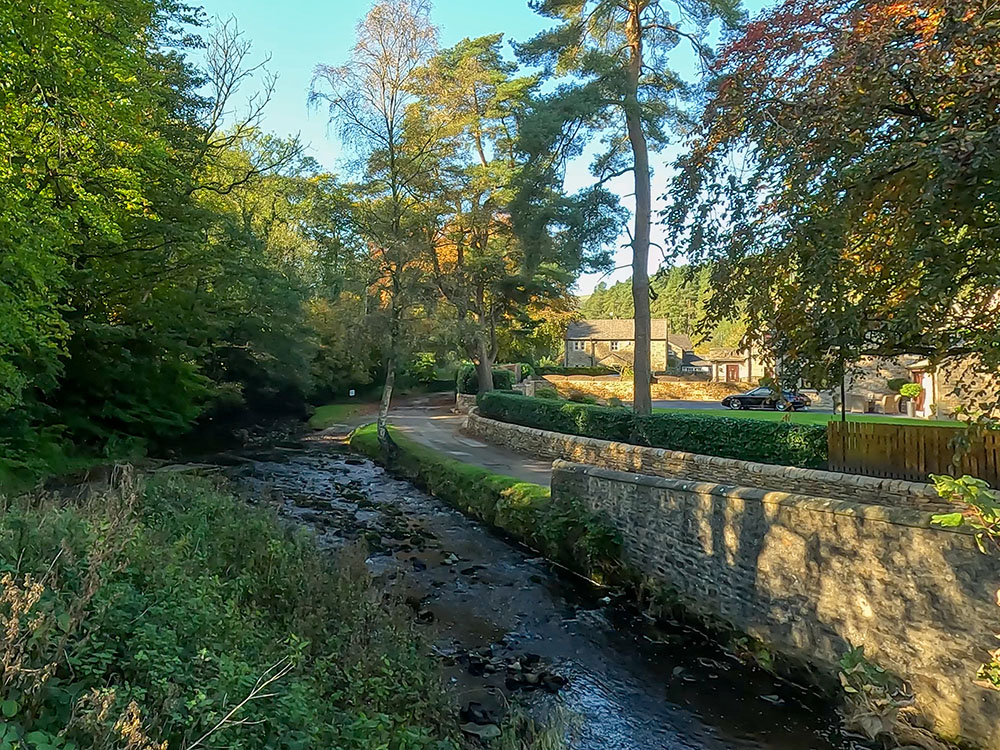 View from the bridge at White Hough, down on the right is the road up to White Hough Outdoor Centre taken earlier in the walk