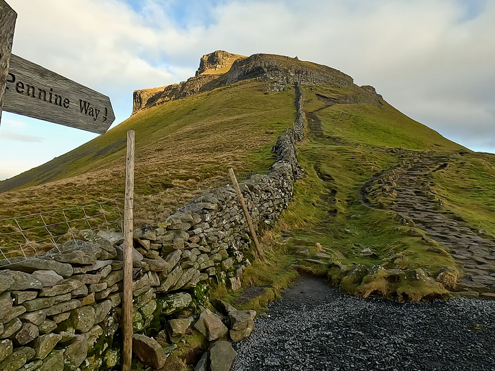 The initial steep steps up Pen-y-ghent on the Pennine Way