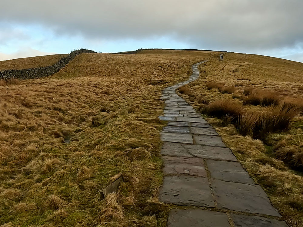 Flagged path heading to the summit of Pen-y-ghent