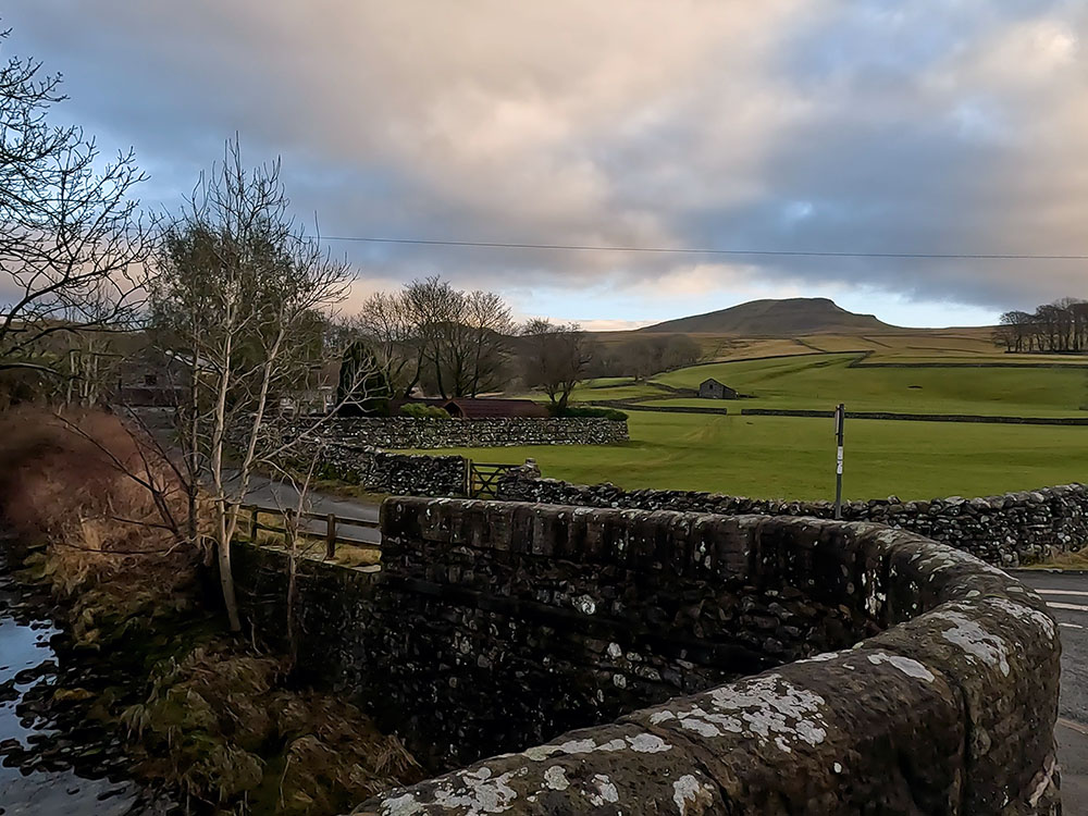 Left turn onto the road by the stream in Horton in Ribblesdale