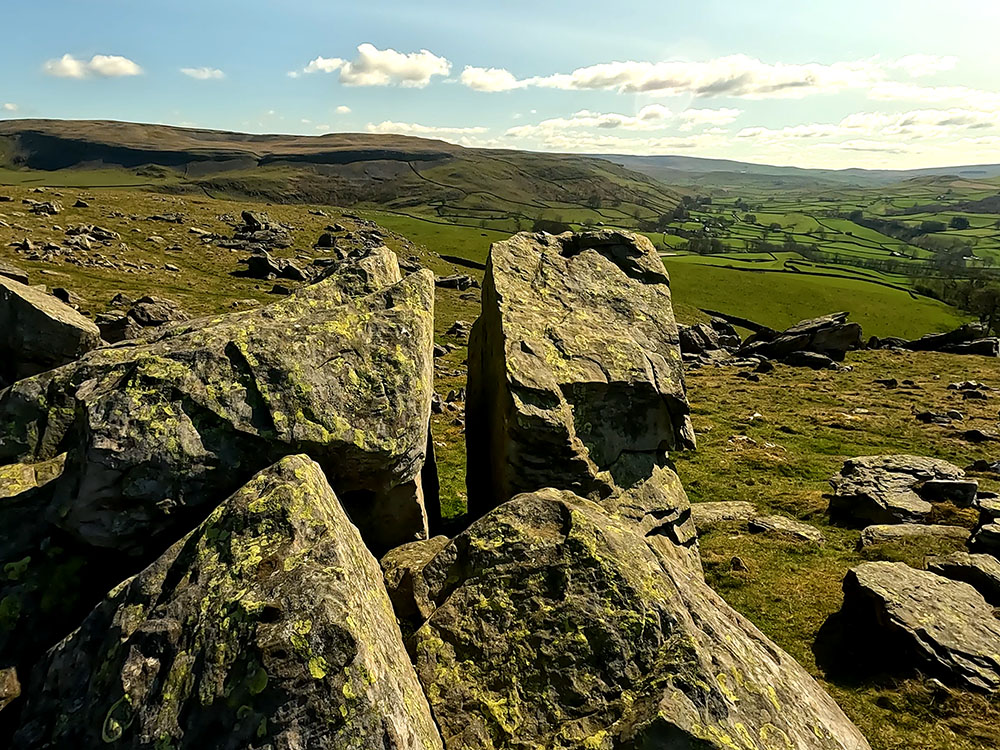 A gap through an Erratic at Norber looking towards Wharfe